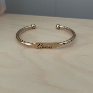 Gold cancer bracelet